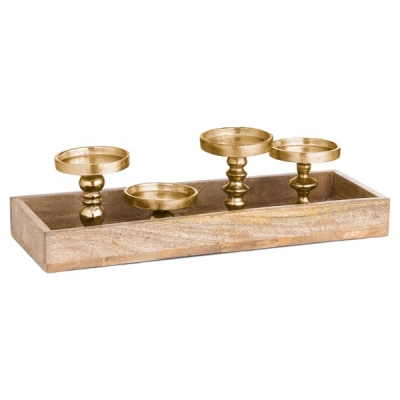 brass candle holder in wooden tray 