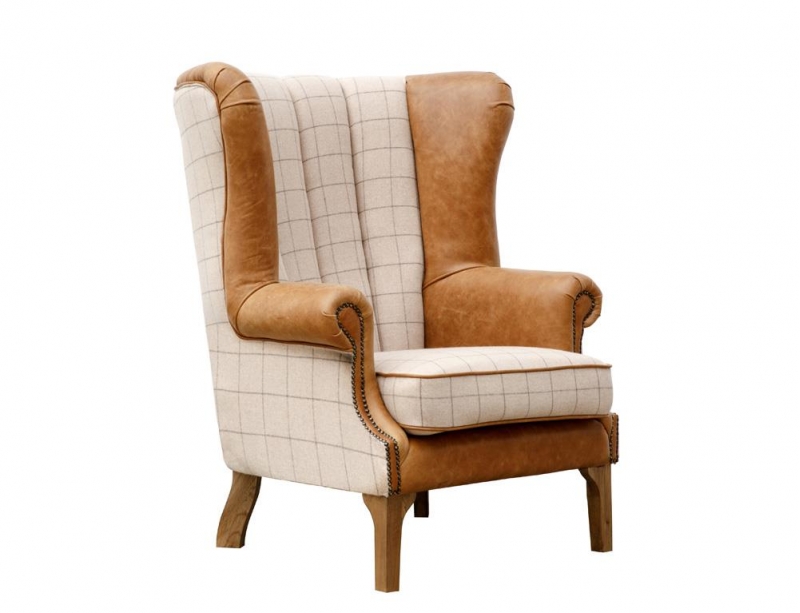 beige and leather wing back chair