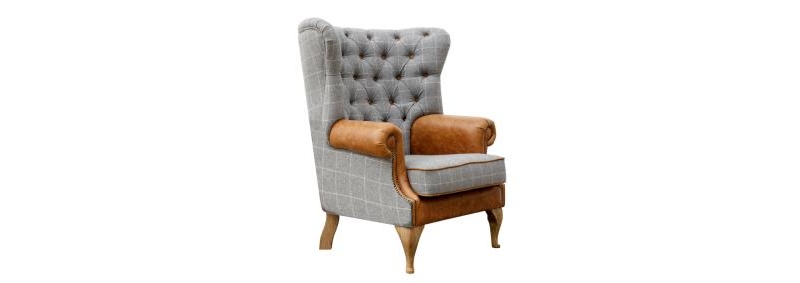 grey and brown leather wing chair