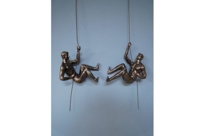 pair of bronze abseiling hanging men