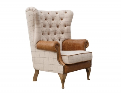 beige and leather wing chair