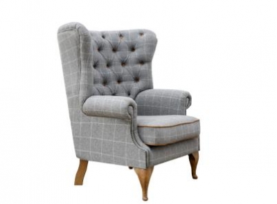 grey and leather wing chair