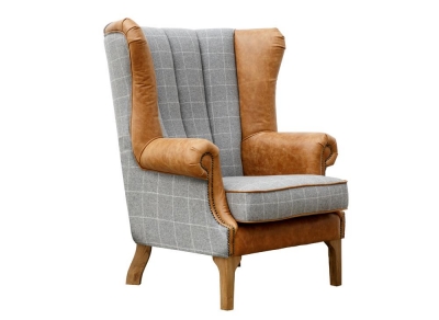 grey and leather wing back chair